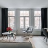 Гостиная — Дизайн-проект квартиры Amsterdam De Pijp в скандинавском стиле, 42 м.кв — студия дизайна TABOORET