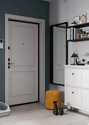 Входной холл с темно-синими стенами, белыми входными дверями, белой тумбой, оранжевым пуфом и черными сапогами на полу