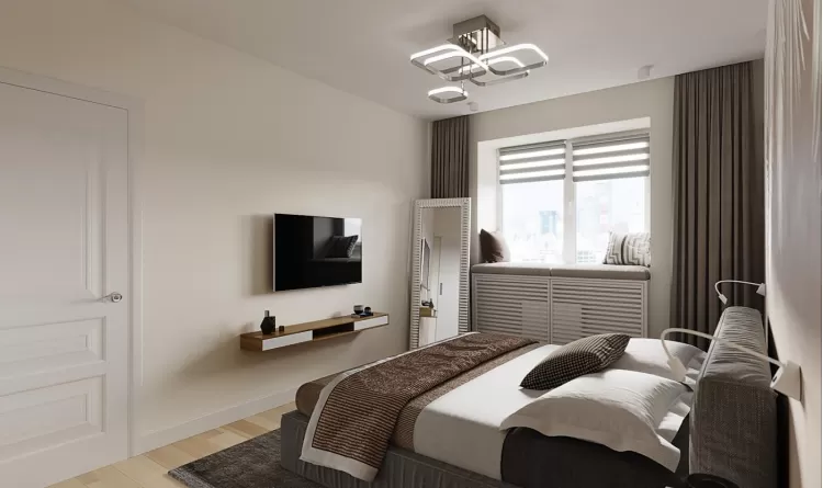 Спальна кімната у світлих тонах у двокімнатній квартирі
